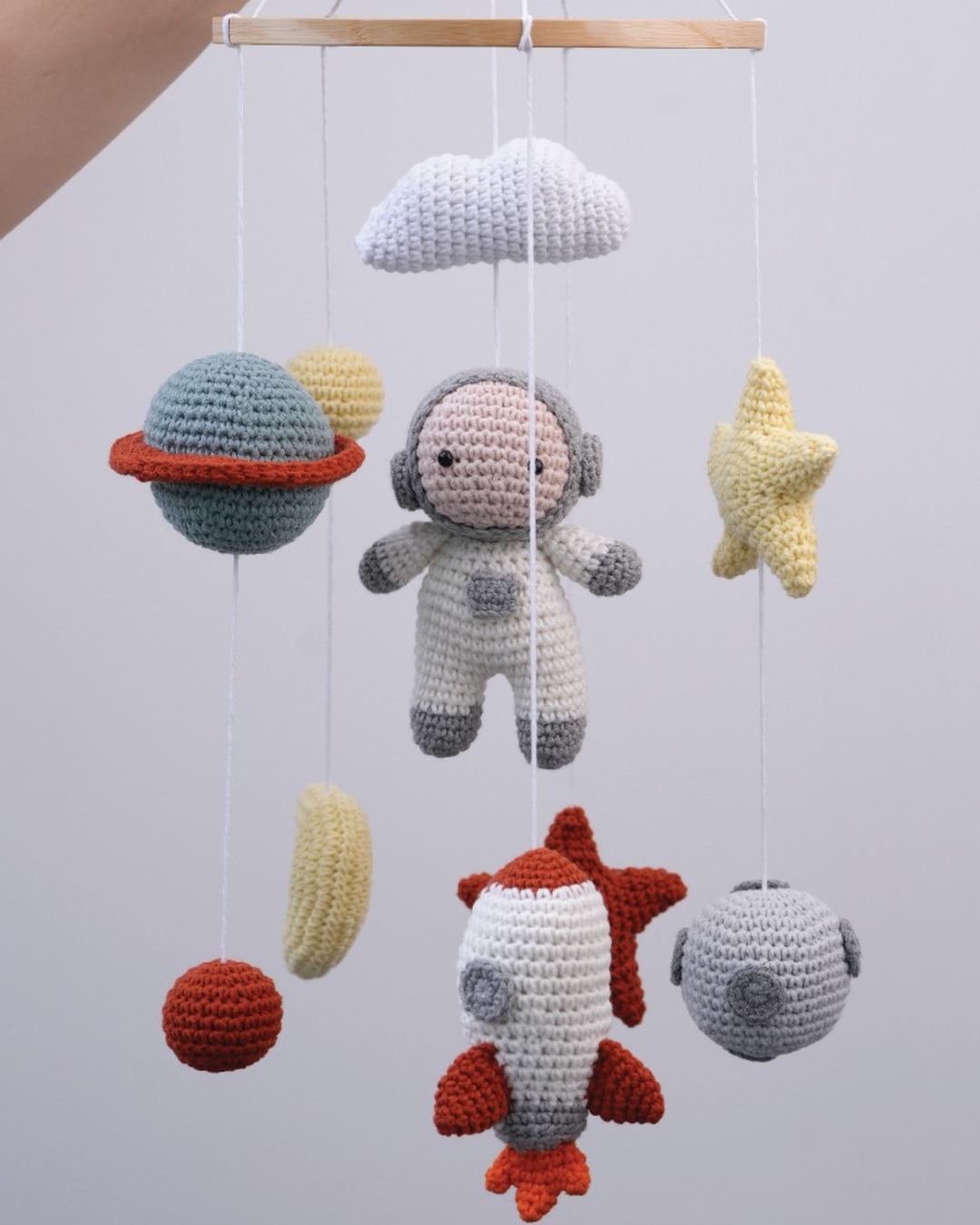 Astronaut space crib mobile — full view with astronaut, rocket, planets and stars