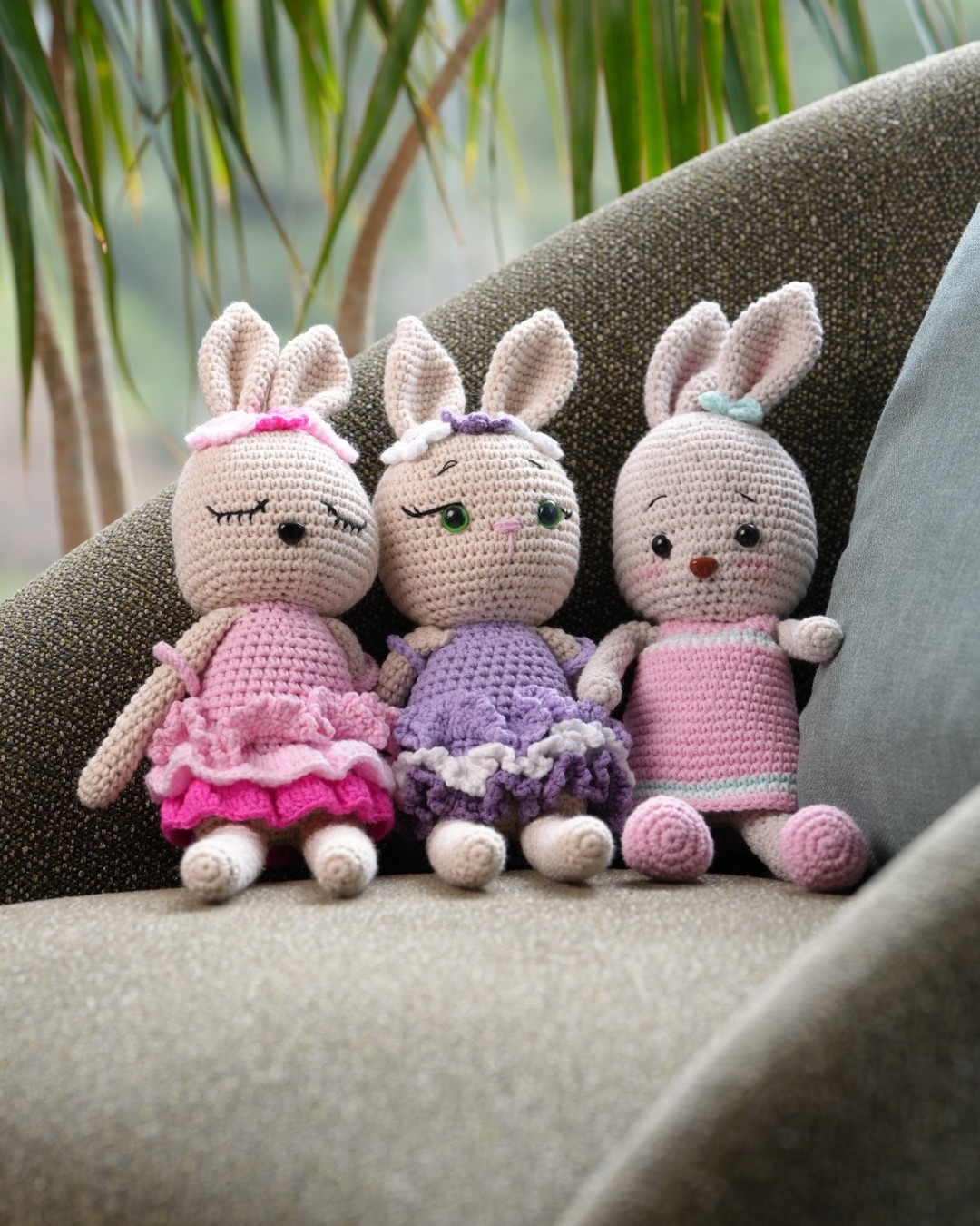 Three handmade Doe Rabbit crochet dolls side by side