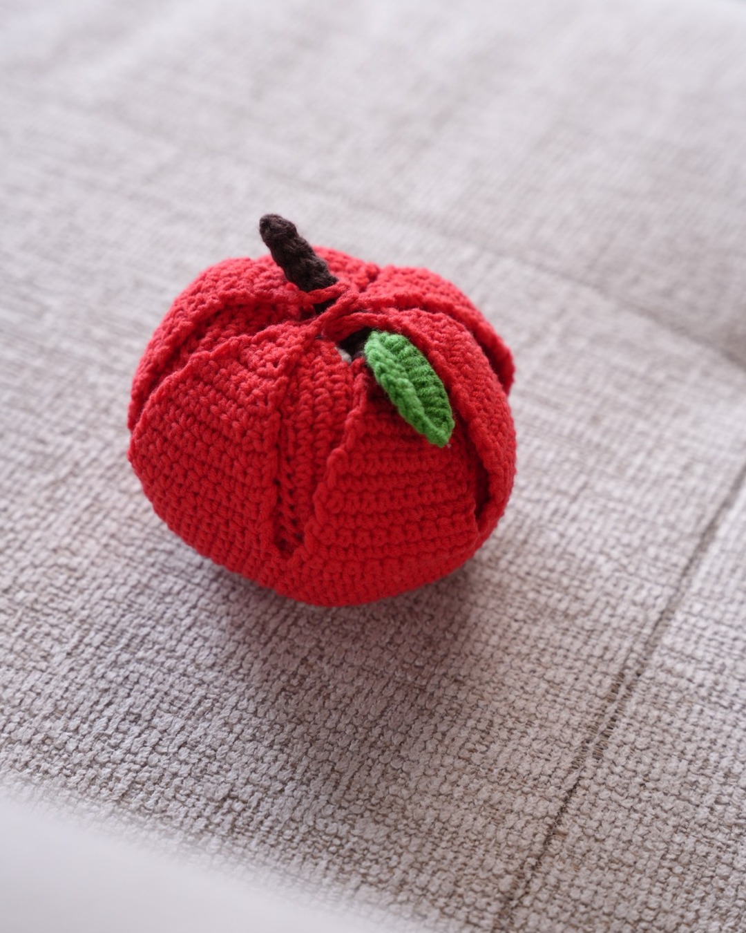 Handmade peelable crochet apple with stem and green leaf